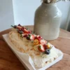 Meringue Roll with berries and cream cheese filling