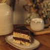 Smetannik Cake Slice Slice of Smetannik cake with cocoa and sour cream