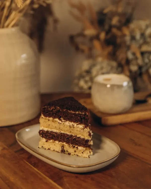 Smetannik Cake Slice Slice of Smetannik cake with cocoa and sour cream