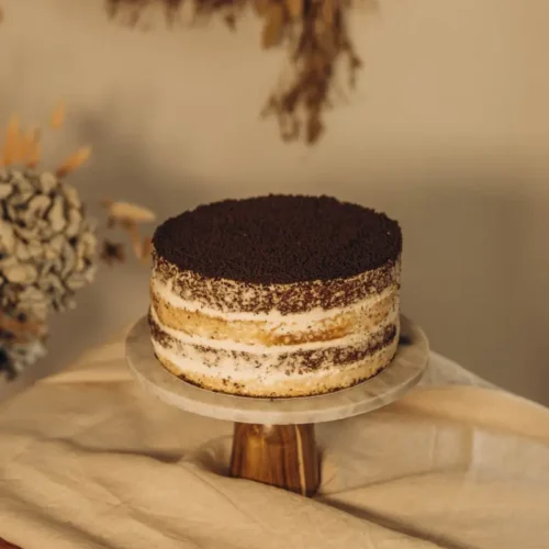 Traditional Smetannik cake with sour cream frosting